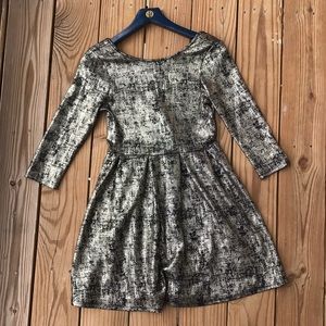 Black and metallic gold dress